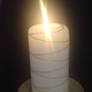 Glowy lit candle