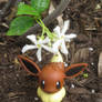 Eevee with white flowers