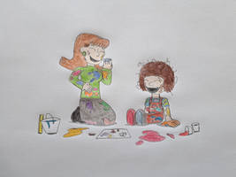 Patty and Penny playing with paint
