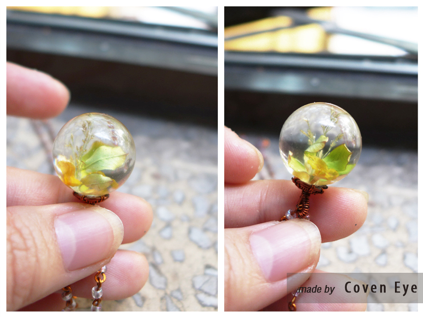 Resin ball pendant with leaves