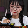 Asian woman's ocean of wine