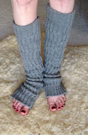 grey warmers, bare feet