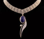 sodalite and pearl pendant by obsidiandevil