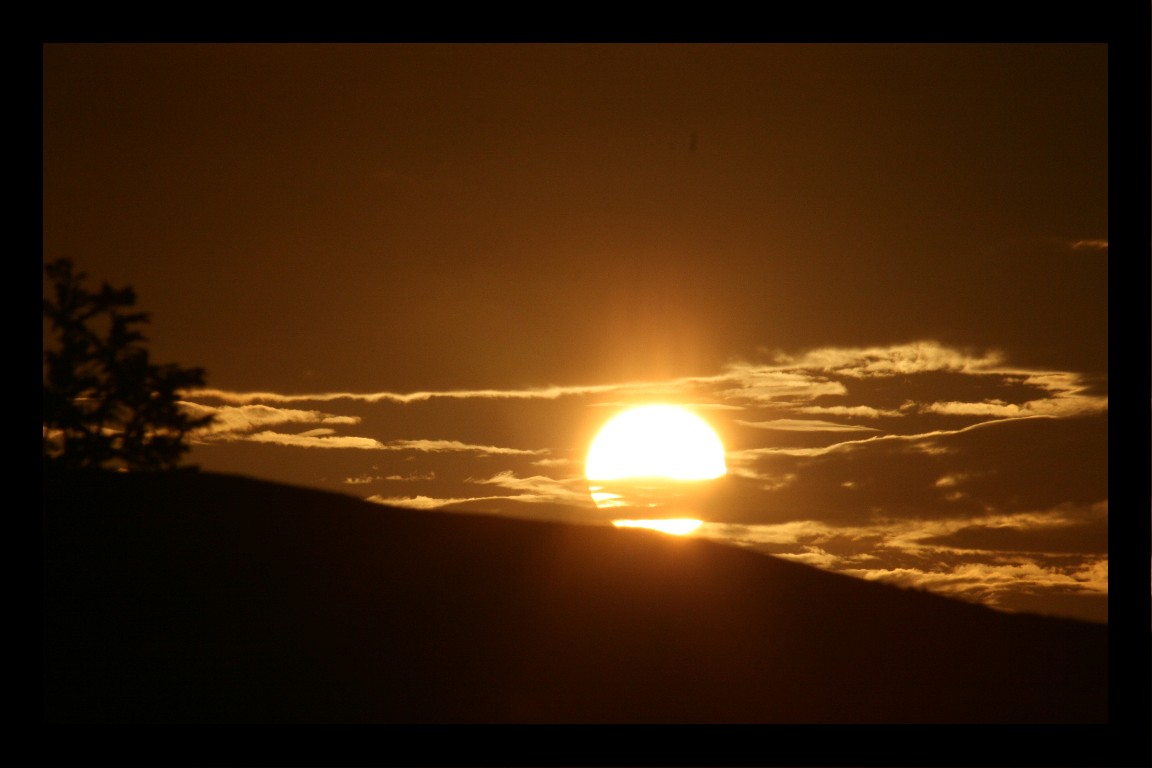 Sun setting behind the rocks..