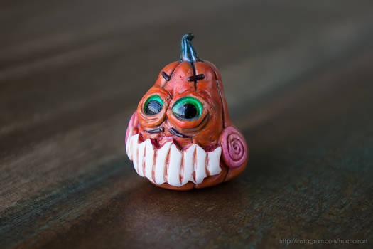 Insidious pumpkin figurine, polymer clay