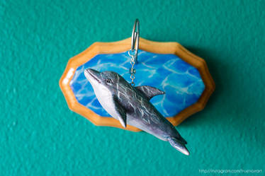 Dolphin wall sculpture, mixed media
