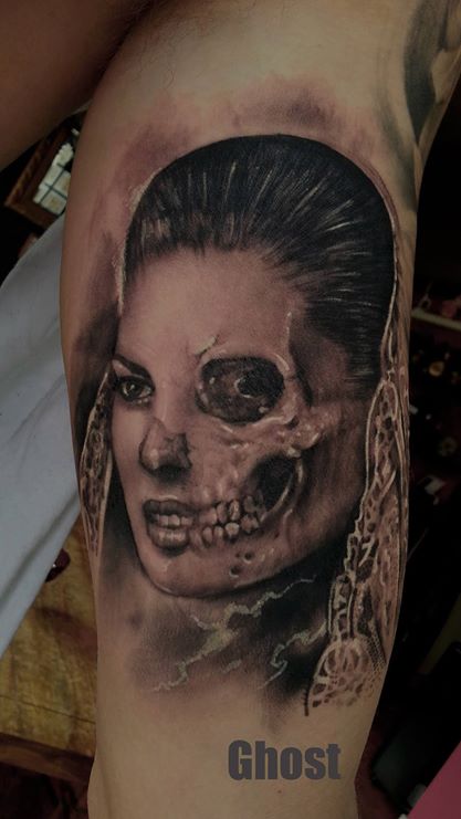 half girl, half skull tattoo