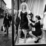 Clerk positioning women in window 20261004190258