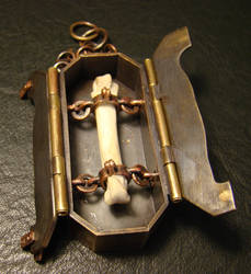 Reliquary with bone open