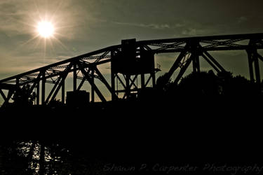 Sun over bridge