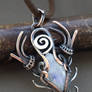 Wire wrap moonstone pendant