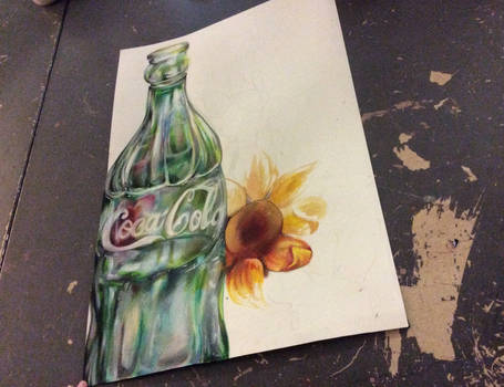 Coke bottle and a sunflower