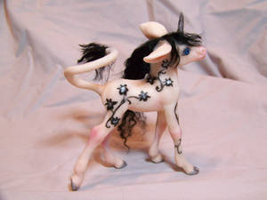 black and white unicorn pony