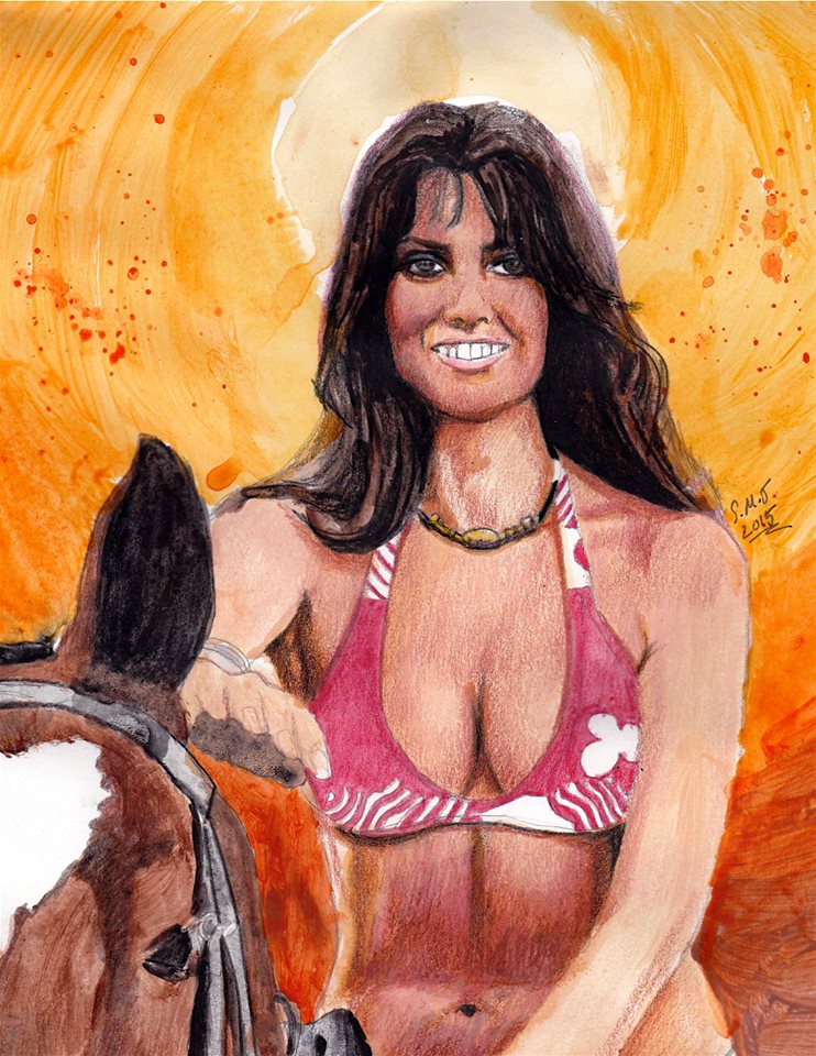 Caroline Munro rides a horse