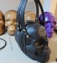 Black skull bag with leather straps