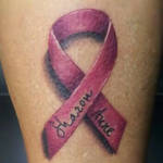 Cancer ribbon tattoo