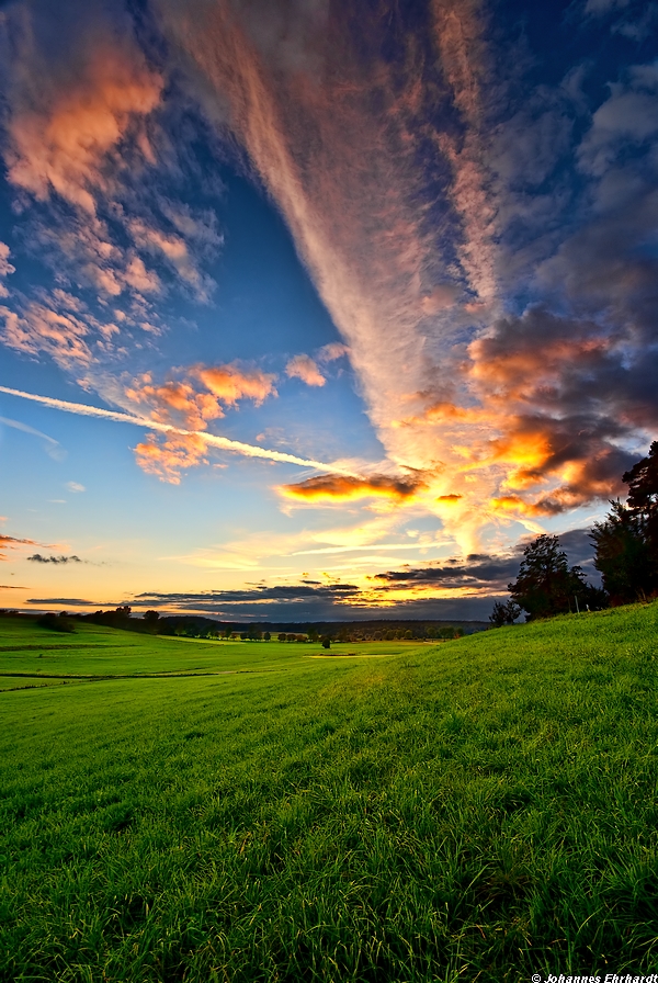 Illuminated clouds at sunset