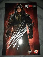 My autographed WWE'2K14 photo of the Undertaker