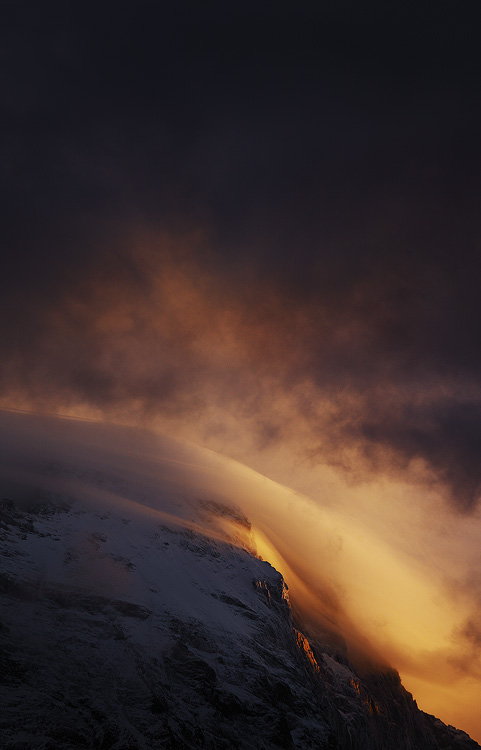 Mt Eiger crawling Clouds