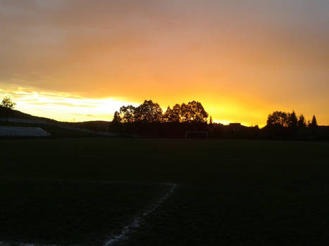 Football pitch sunset.
