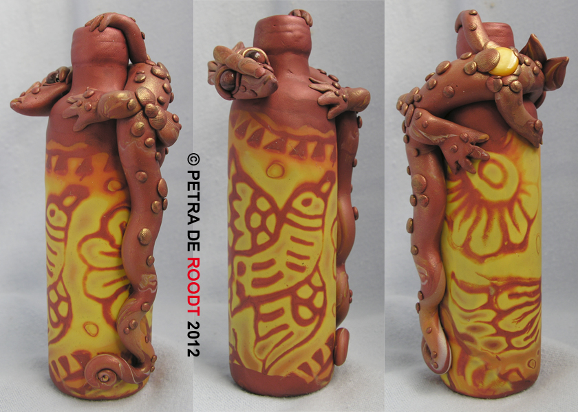 Bottle with bird print and added dragon