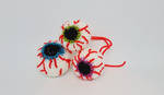 Spooky crochet eyeball - free pattern by Ludaritz