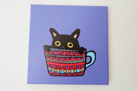 black cat in a cup