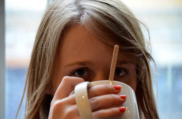 Tea and orange nails