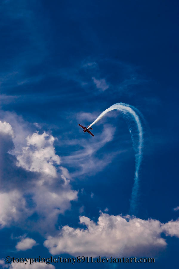 Blue sky, red plane