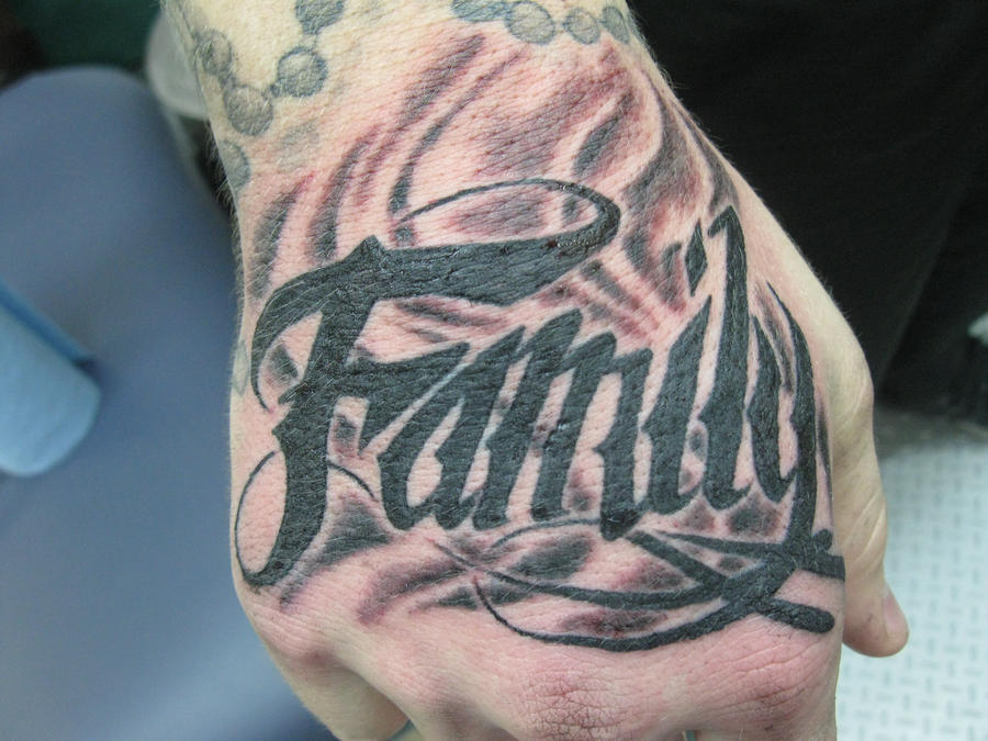 'Family' hand tattoo