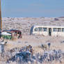 snowy junkyard bus