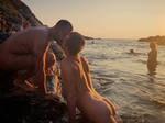 nude men kissing in the surf. Mermen 1