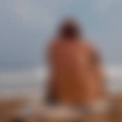 Nude male on the beach