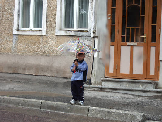 A boy with umbrella...