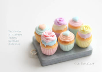 Miniature Pastel Cupcakes with beautiful frostings