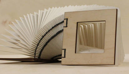 Laser-cut Coptic-bound Book