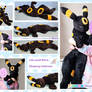 Sleeping big Umbreon pokemon plushie