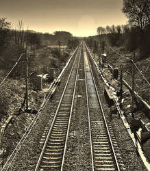 Train tracks perspective in sepia