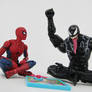 Spider-Man and Venom play a boardgame