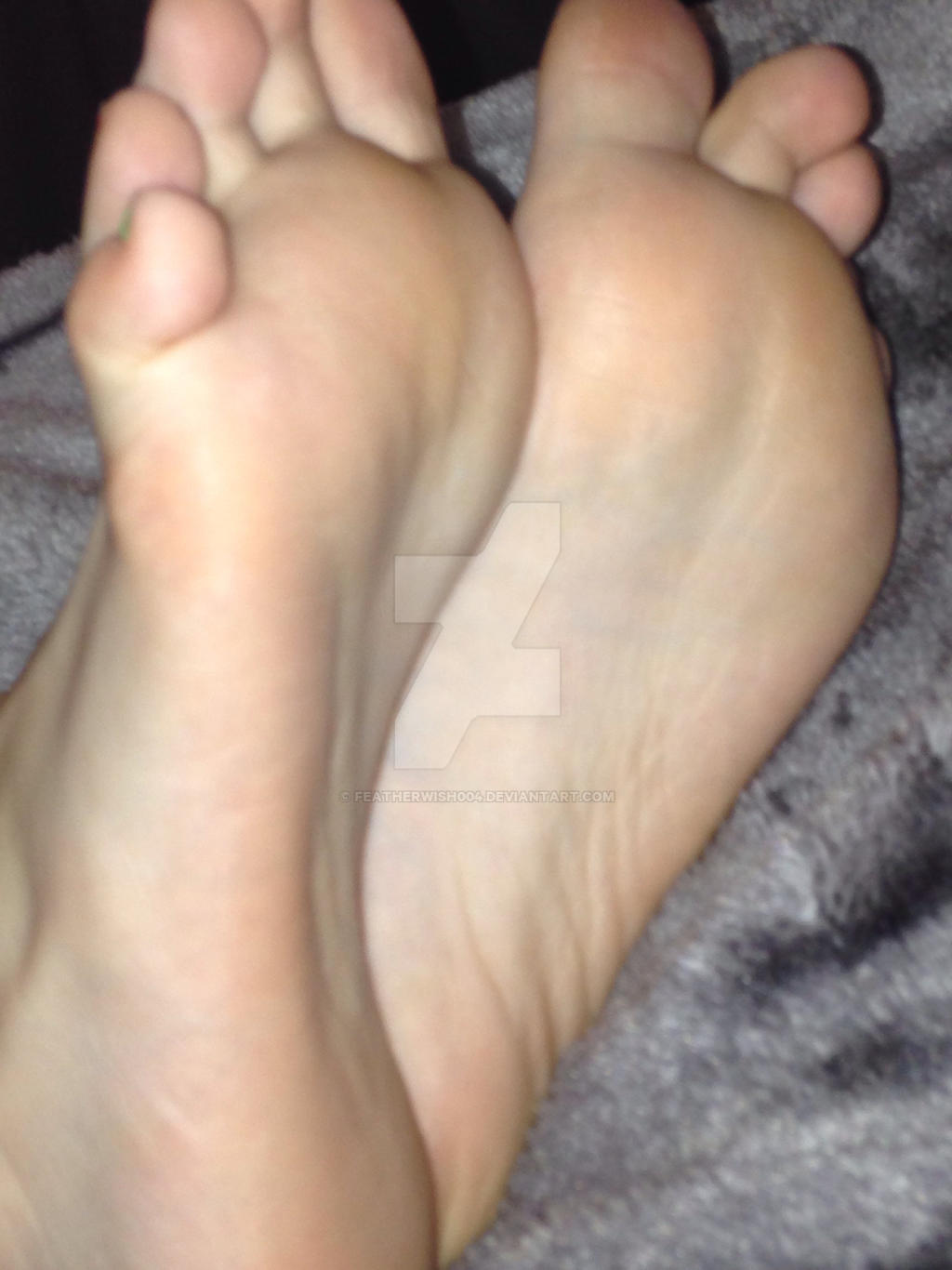 Both my ticklsih feet XD