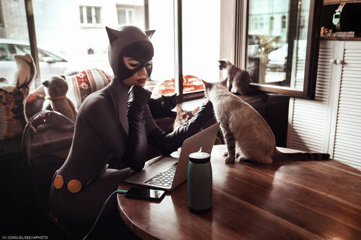 Catwoman with cats