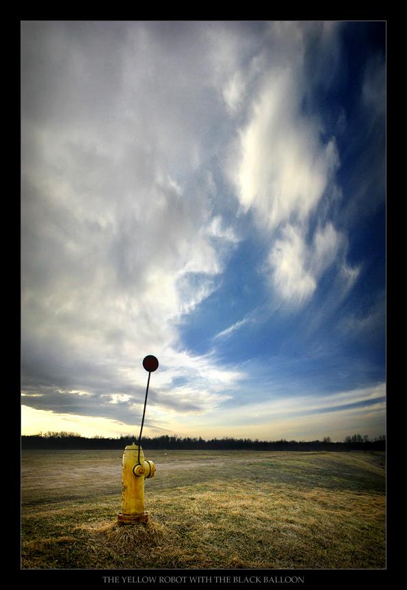 Yellow Robot w. Black Balloon