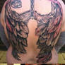 Angel wings tattoo