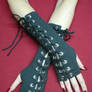 Gloves with corset closure