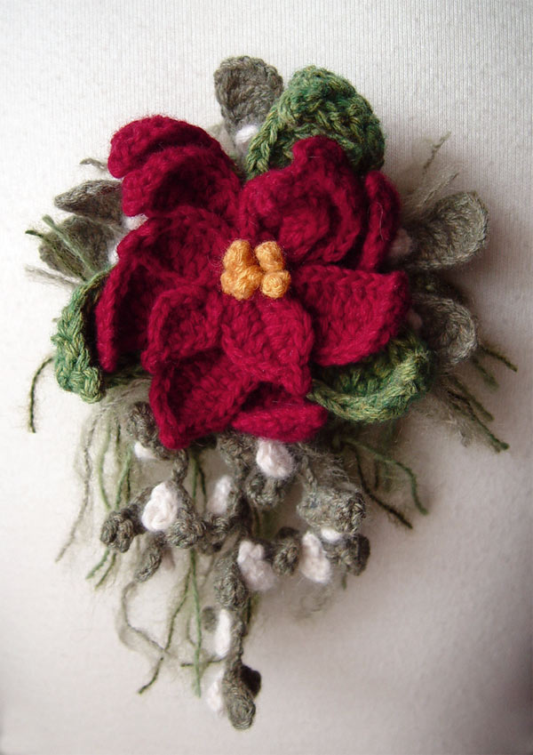 Crochet poinsettia corsage