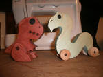 Snake roller toy and another dino. by Tyr73