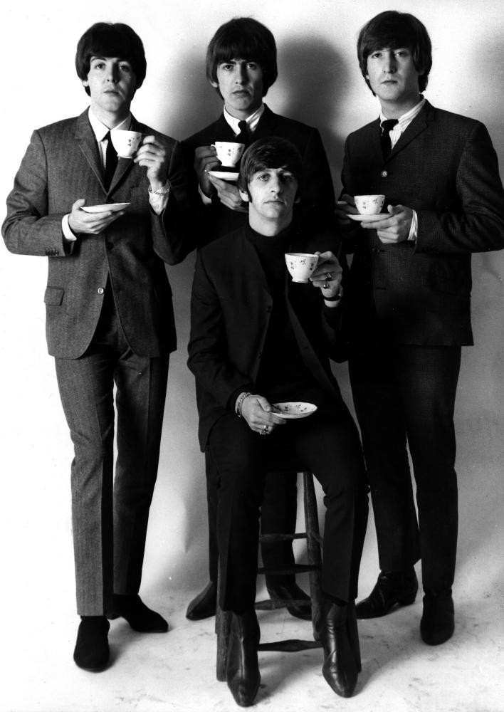 The Beatles drinking tea