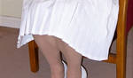 HER NICE WHITE PLEATED SPANKING SKIRT