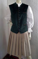 VEST OVER BLOUSE, WITH PLEATED SKIRT