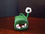 Green cube-eye stalk monster